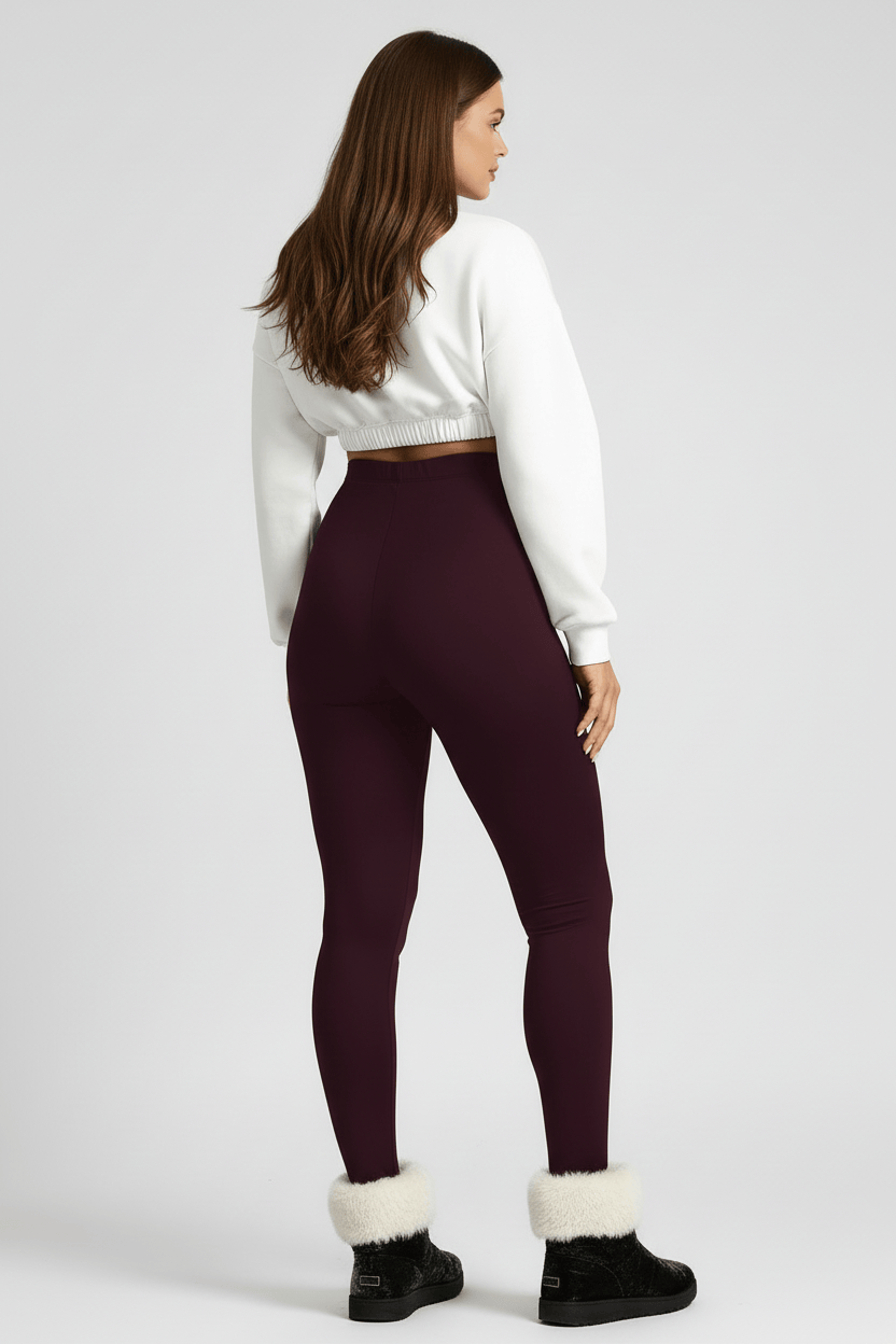 Back 3/4 full-length view, woman wearing maroon CozyTherm™ leggings D#color_maroon