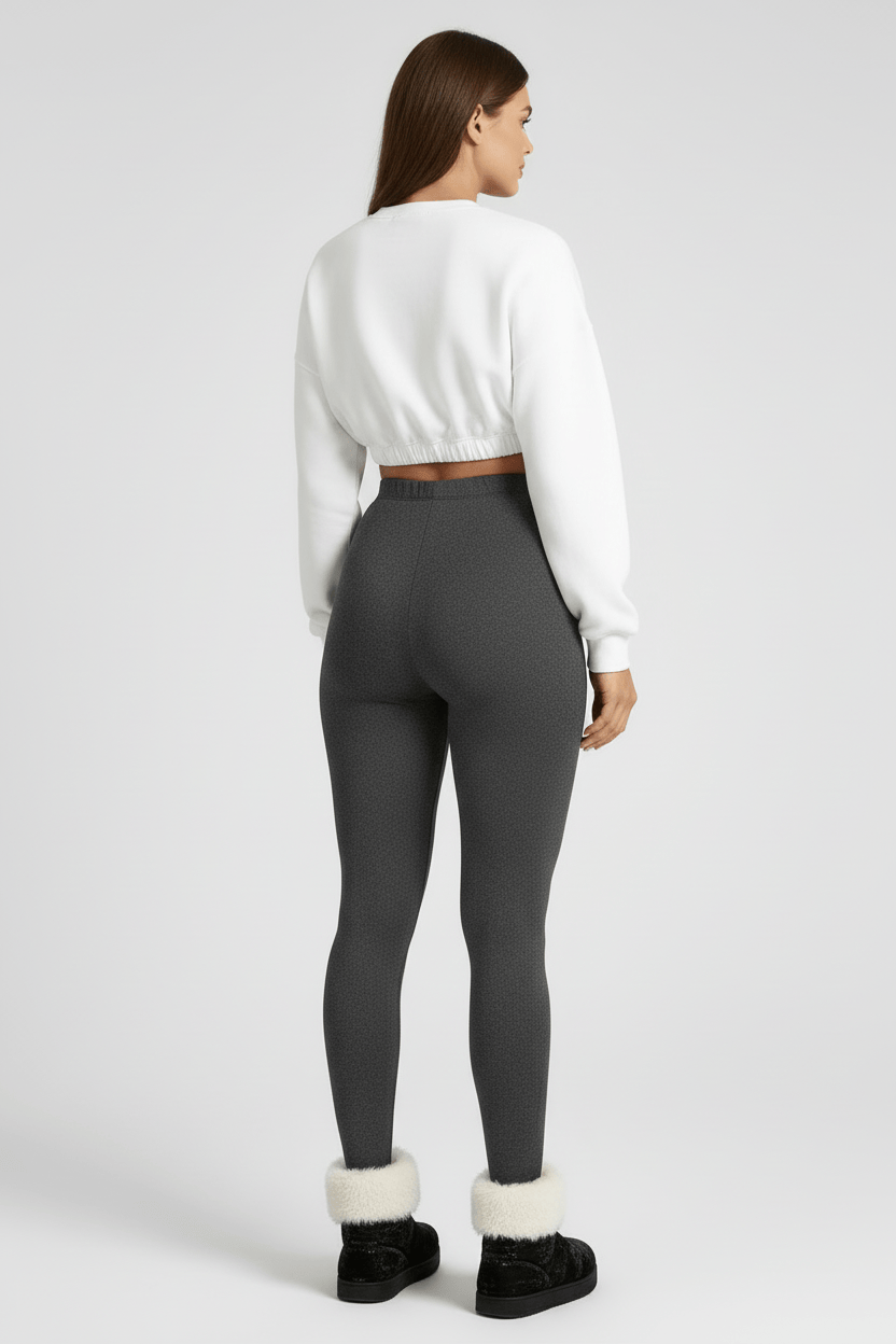 Back 3/4 full-length view, woman wearing charcoal CozyTherm™ leggings D#color_charcoal