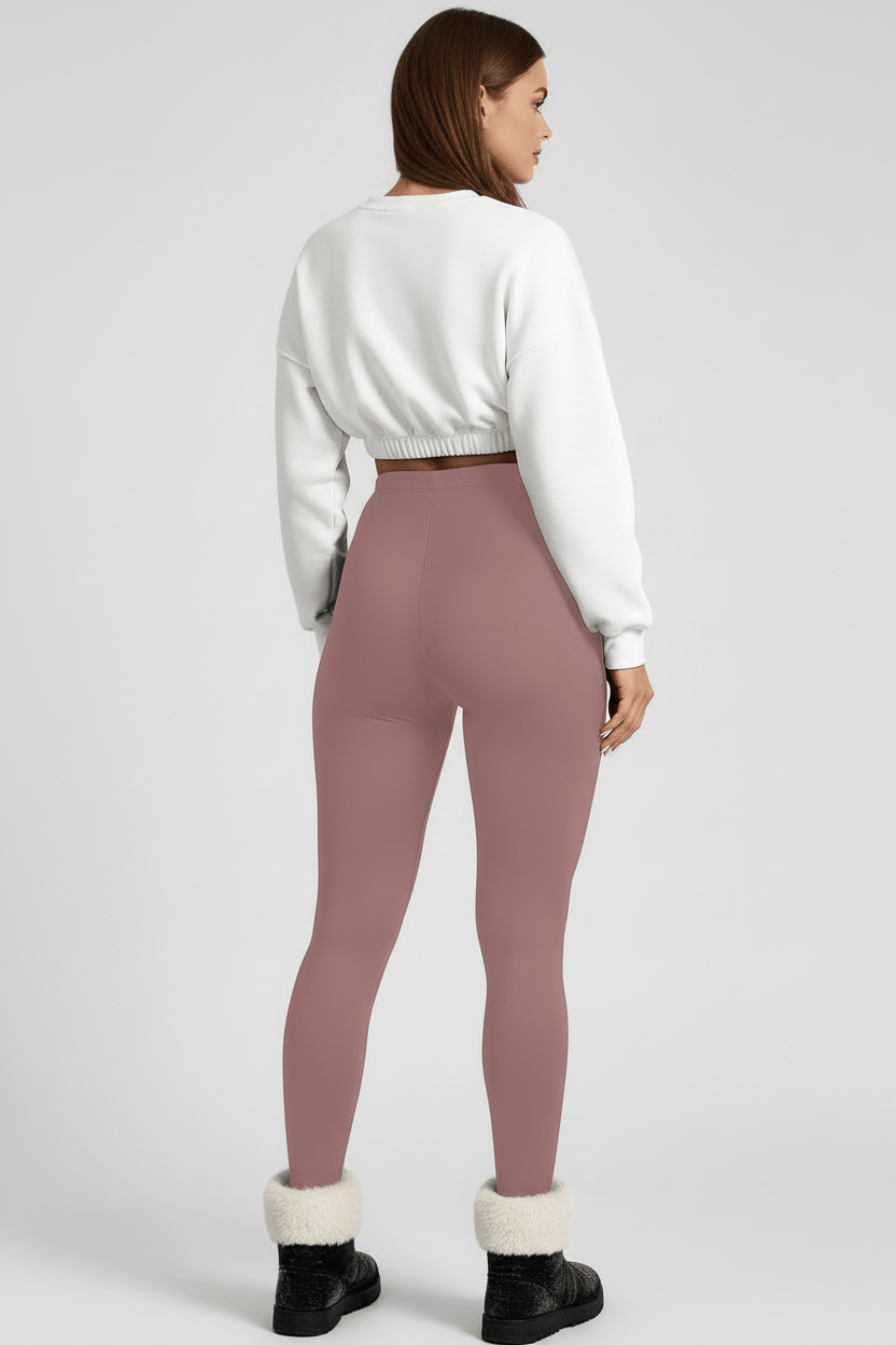 Back 3/4 full-length view, woman wearing rose pink CozyTherm™ leggings D#color_rose-pink