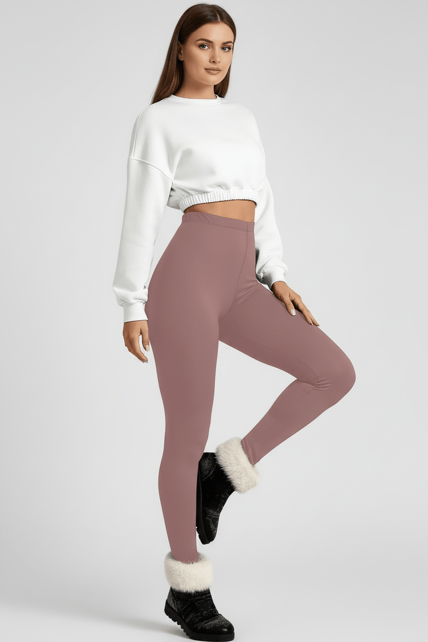 Stretch pose showing movement and fabric stretch, rose pink CozyTherm™ leggings G#color_rose-pink