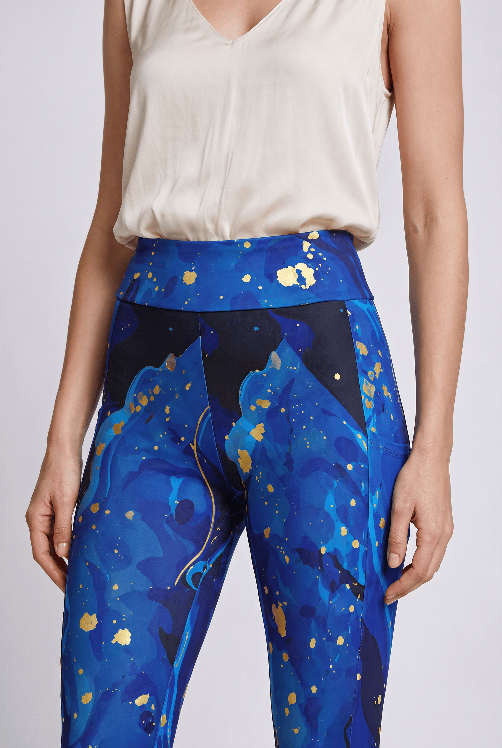 Gilded Tide Pocket Leggings in Cobalt Blue, up-close side view showing the side-pocket construction. D#color_cobalt-blue