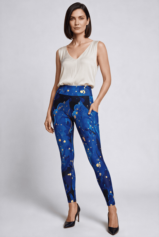 Model wearing women's high-rise Gilded Tide Pocket Leggings in Cobalt Blue, full-length three-quarter view. A#color_cobalt-blue